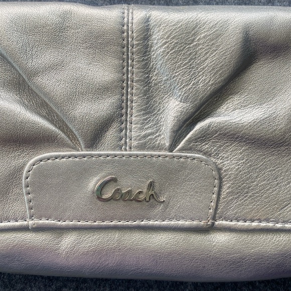 Coach Wristlet in Silver/Gold Depending on Lighting - Picture 7 of 13